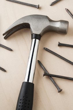 Claw hammer and nails clipart