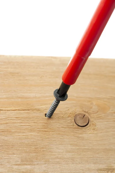 Chave de fenda no parafuso de madeira — Fotografia de Stock