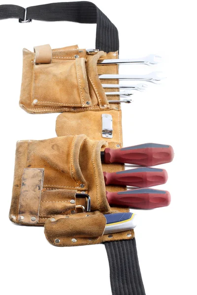 Tool belt with screwdriver and spanner — Stock Photo, Image