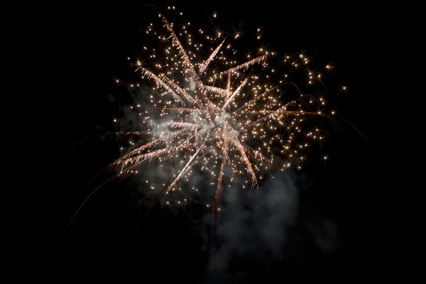 stock image Fireworks explode into a ball of sparks