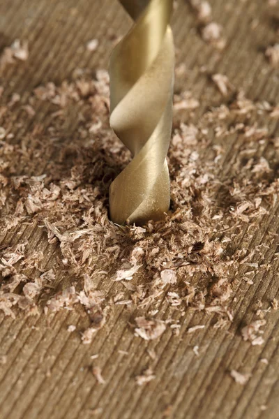 Bit drilling through wood — Stock Photo, Image