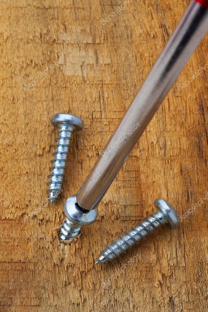 Screwing screws — Stock Photo © laurenthive 11384115