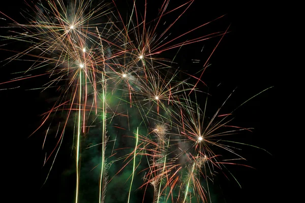 Stock image Red and green fireworks