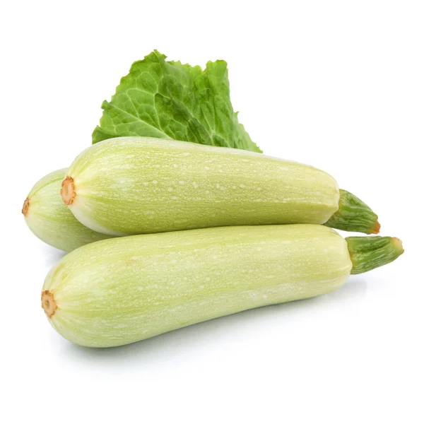Fresh vegetable marrow decorated with green leaf lettuce. Isolated on white — Stock Photo, Image