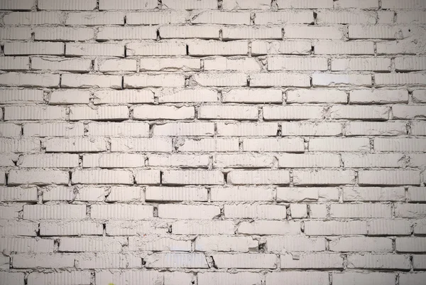 Bianco dipinto vecchio muro di mattoni Immagine Stock