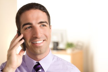 Happy business man on phone clipart