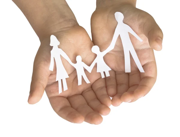 Familj i barnets händer — Stockfoto