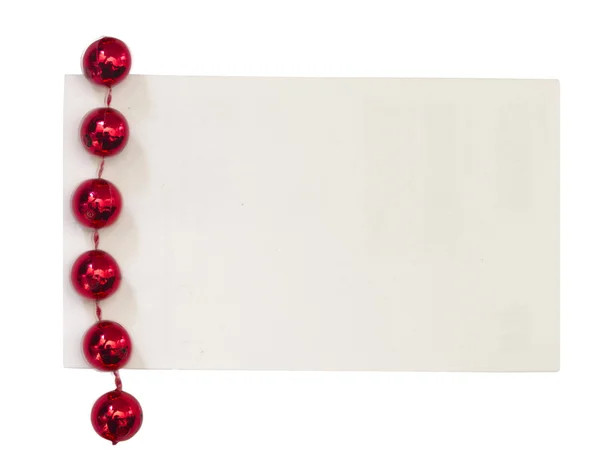 Blanco papier opmerking met rode parels — Stockfoto