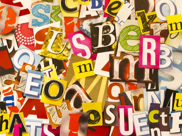 Cut letters from newspaper — Stock Photo, Image