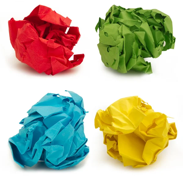 Collection of colorful crumpled papers over white background — Stock Photo, Image