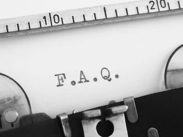 F.A.Q. en la máquina de escribir —  Fotos de Stock