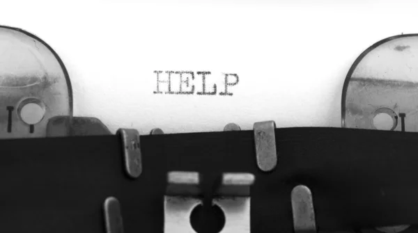 Help title on the old typewriter — Stock Photo, Image