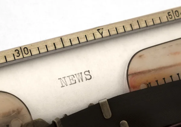 News title on the typewriter — Stock Photo, Image