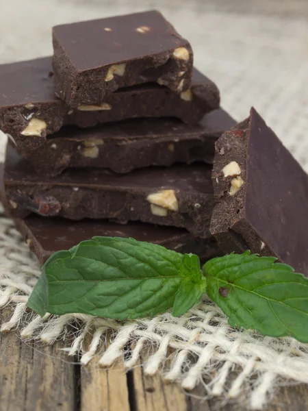Chocolate with mint leaves — Stock Photo, Image