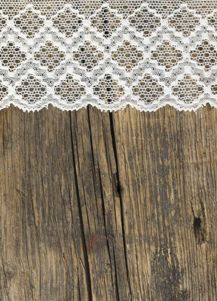 Beautiful old fashion lace on the wooden background — Stock Photo, Image