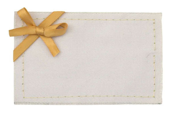 Etiqueta têxtil com fita de ouro — Fotografia de Stock