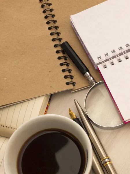Cadernos com xícara de café — Fotografia de Stock