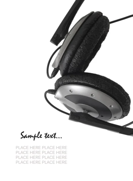 Az a hely, a szöveg fehér fülhallgató — Stock Fotó