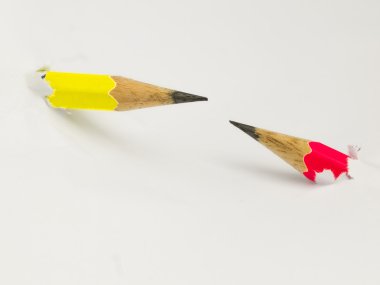 Pencils pierced the sheet of paper clipart