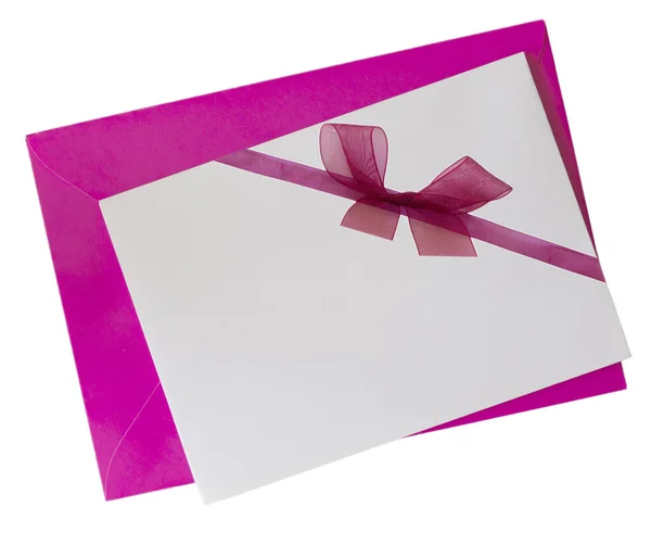 Poznámka: prázdný papír s růžovými luk a obálka — Stock fotografie