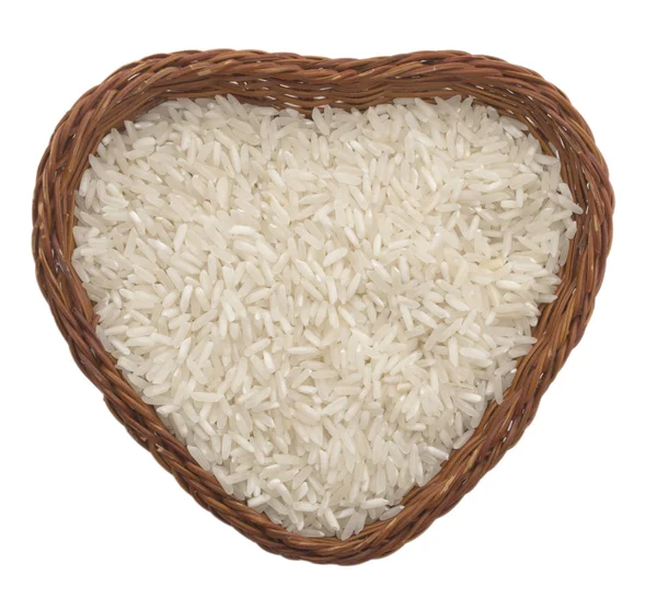 Ryż w naczyniu kształt serca — Zdjęcie stockowe