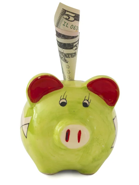 Dollars in the piggy bank over white — Stock Photo, Image