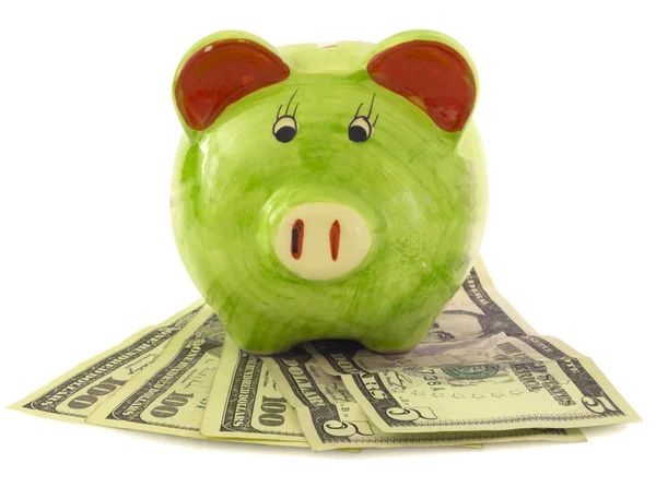 Dollars and the piggy bank — Stock Photo, Image