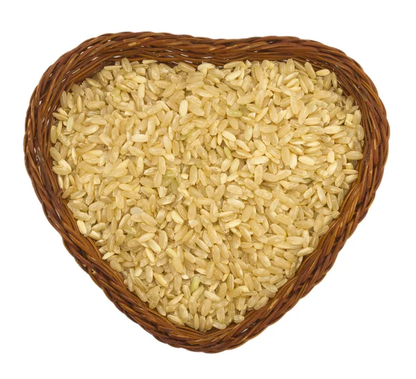 Light brown rice in the heart shape pot — Stock Photo, Image