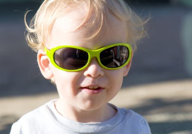 Little boy wearing sunglasses clipart