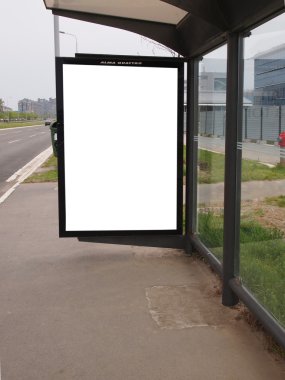 City light on the bus stop, blank space for your ad clipart