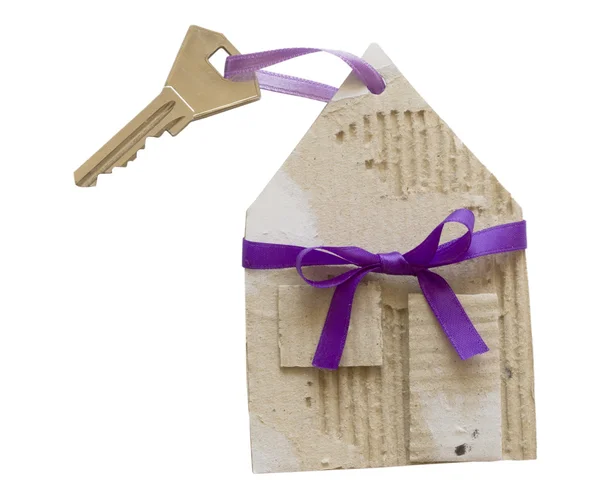 Haus als Geschenk mit Schlüssel — Stockfoto