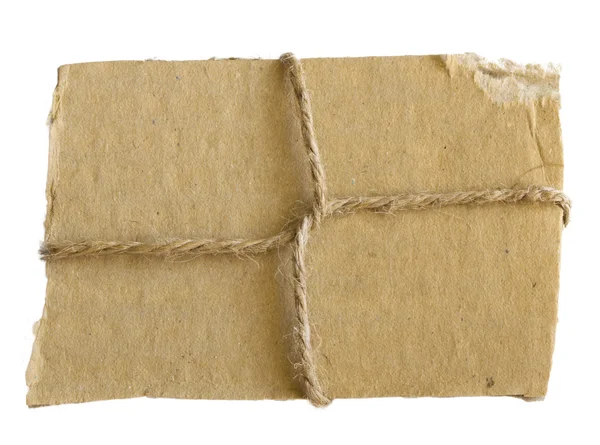 Vlnitého papíru list s řetězcem — Stock fotografie