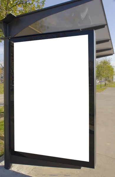 Stad licht op de bushalte, lege ruimte voor uw advertentie — Stockfoto