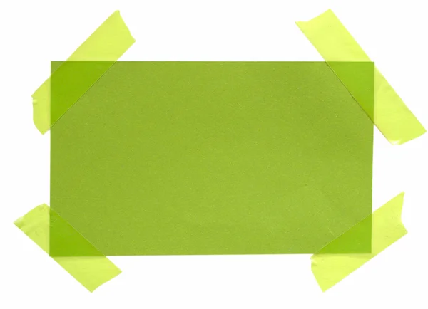 stock image Green paper note with sticky tape isolated on white background