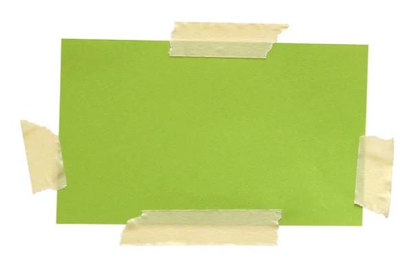 Nota de papel verde con cinta adhesiva aislada sobre fondo blanco — Foto de Stock