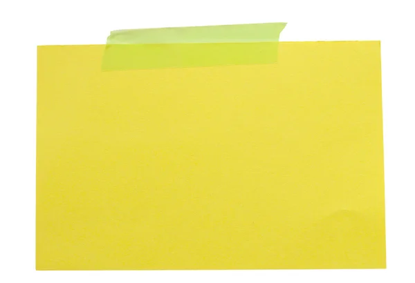Yellow paper note with green sticky tape — Stock Photo, Image