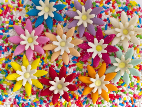 Γλυκά καραμέλες floral φόντοsladké květinové bonbóny pozadí — Stock fotografie