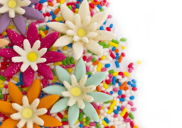 Słodkie cukierki kwiatowy tło — Zdjęcie stockowe