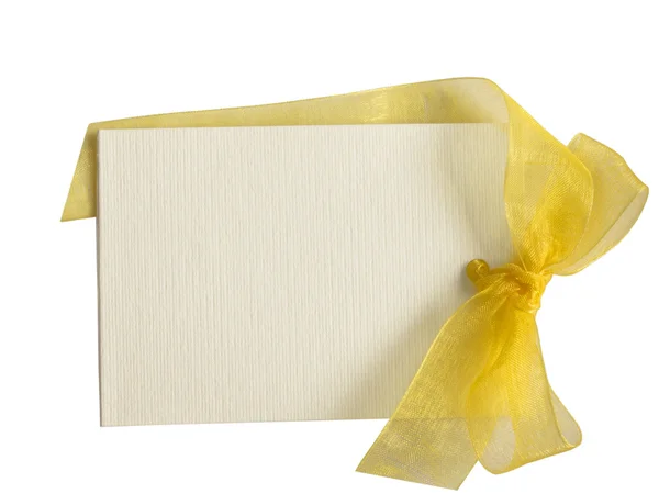 White tag with transparent yellow bow — Stock Photo, Image