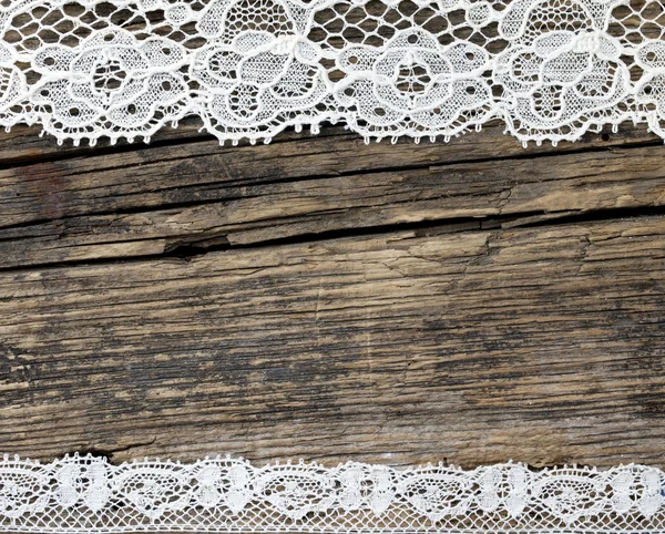 木製の背景に美しい古いファッション レース — ストック写真