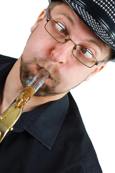 Гримас с саксофоном — стоковое фото