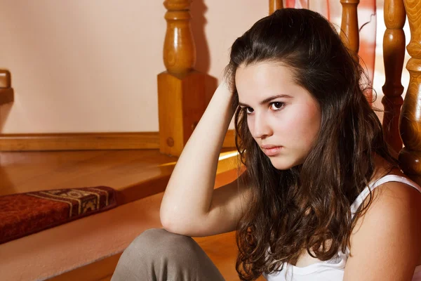 Sad teenage girl at home — Stock Photo, Image
