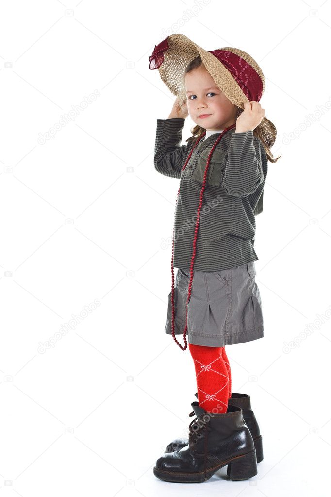 Little girl in big shoes — Stock Photo 