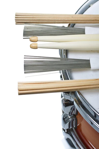 Drumsticks resting on a snare drum — Stock Photo, Image