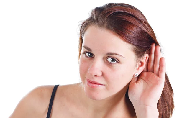Jovem mulher ouvindo fofocas — Fotografia de Stock