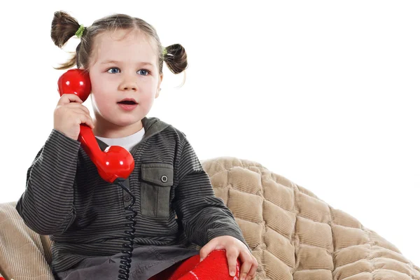 Linda niña llamando por teléfono —  Fotos de Stock