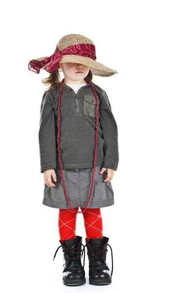 Little girl under big hat — Stock Photo, Image