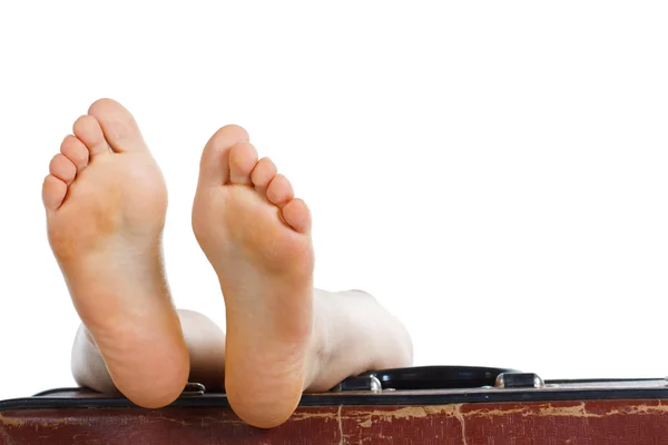 stock image Feet on top of suitcase