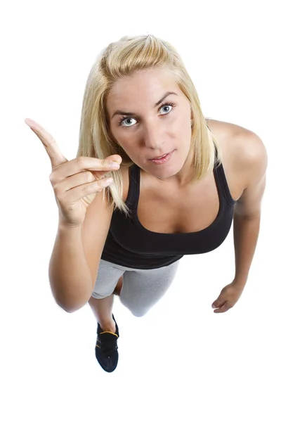 Attractive young woman with her finger up — Stock Photo, Image