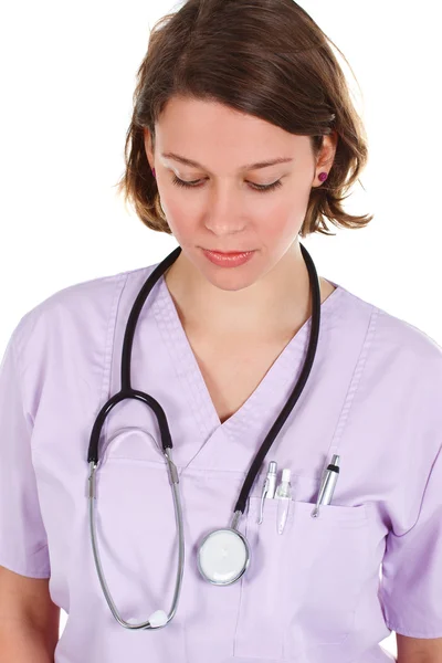 有吸引力的女医生用听诊器在白色背景 — 图库照片
